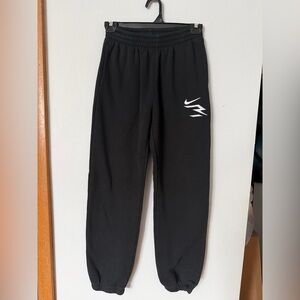 Nike Kids Black Joggers with White Logo